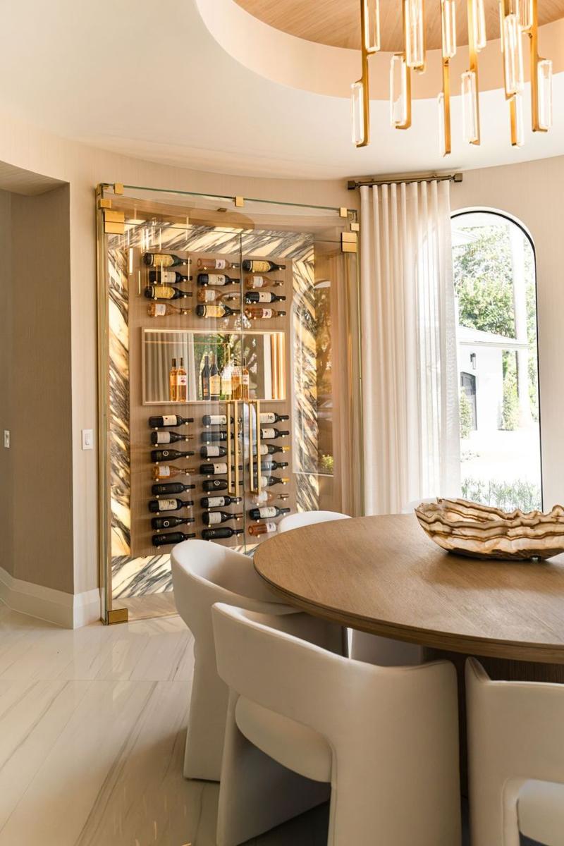 Glass wine room next to the dining area